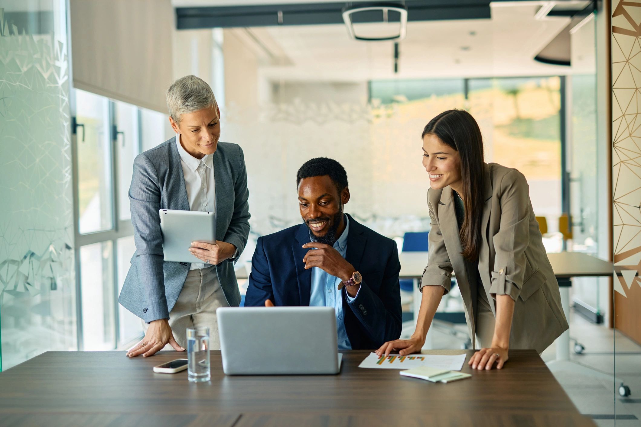 Professionals collaborating in a modern office