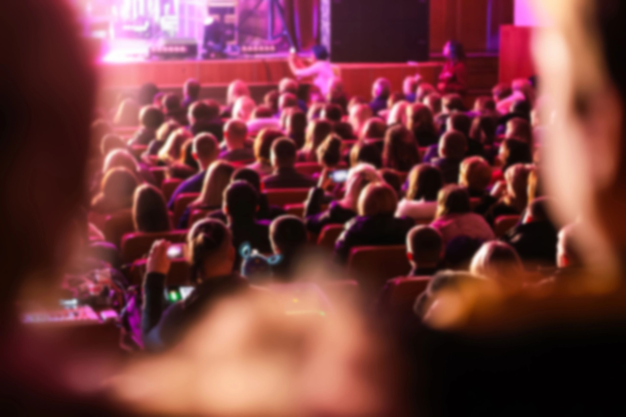 Audience seated in an auditorium